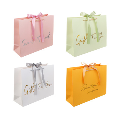 Пакет подарочный вскч бум., 210 гр, с лентой, L 32x26x11 см, 4 цвета